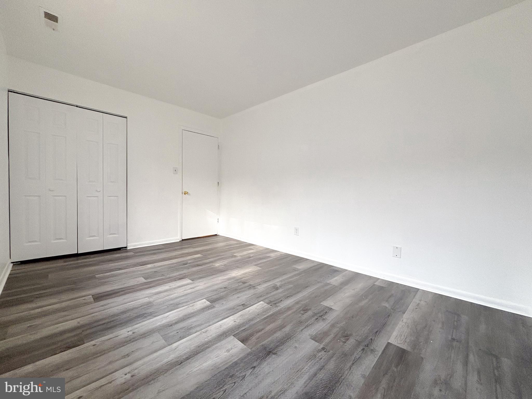814 A Windstream Way, Unit 814A Edgewood, MD 21040 - Photo 18 of 27 a view of empty room with wooden floor