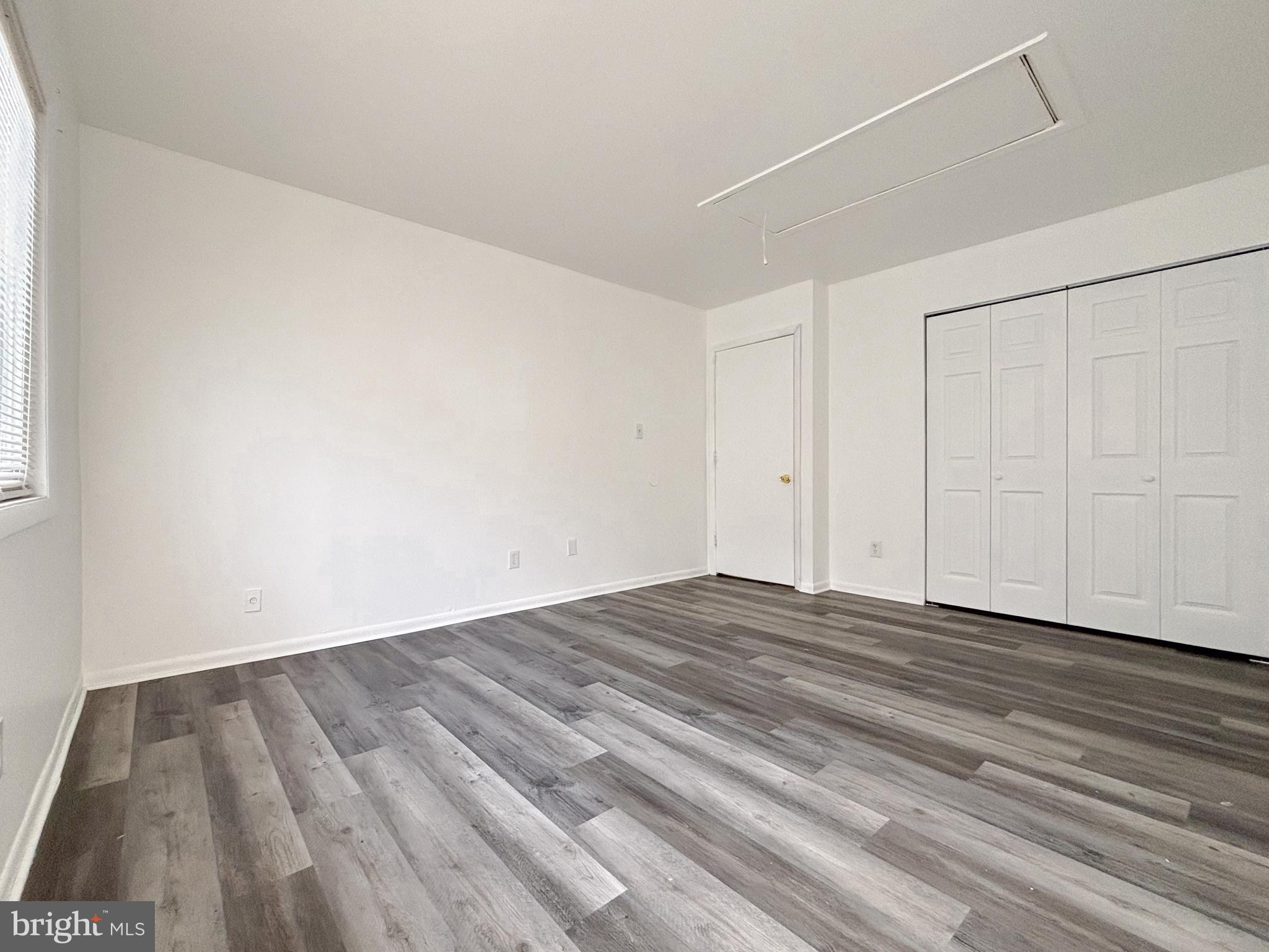 814 A Windstream Way, Unit 814A Edgewood, MD 21040 - Photo 21 of 27 a view of an empty room with wooden floor