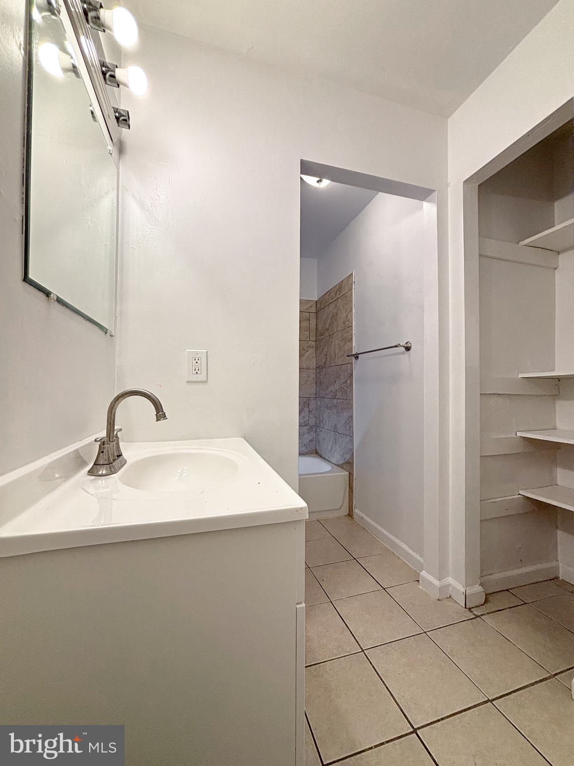 814 A Windstream Way, Unit 814A Edgewood, MD 21040 - Photo 27 of 27 a bathroom with a sink and a mirror