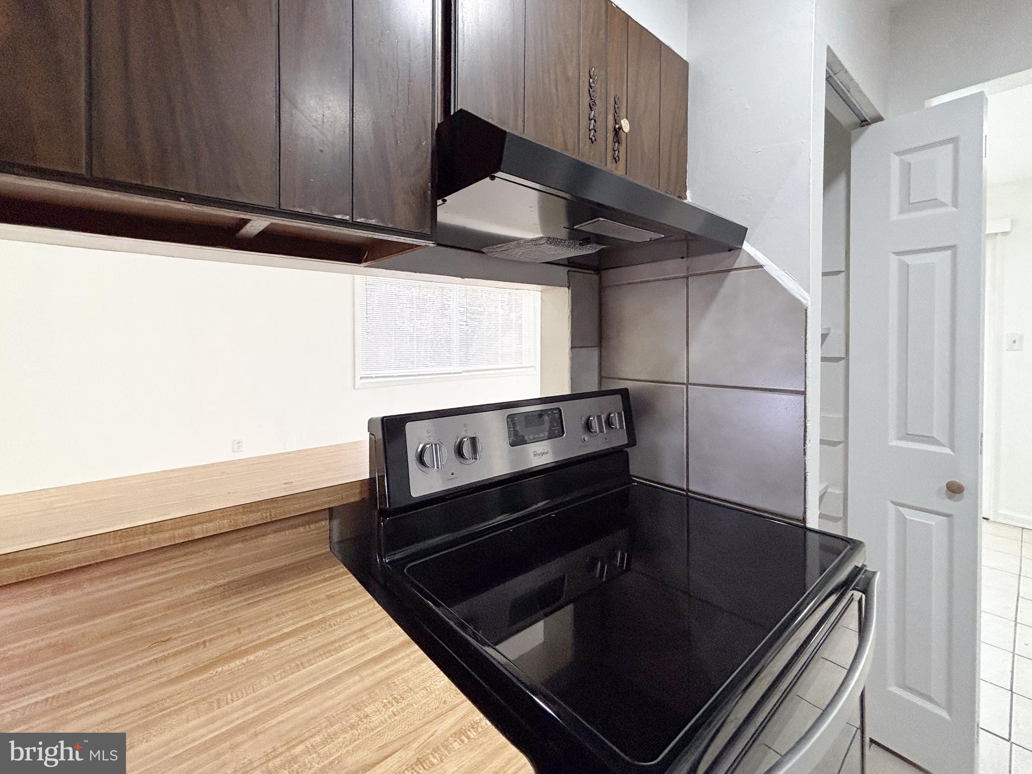 814 A Windstream Way, Unit 814A Edgewood, MD 21040 - Photo 7 of 27 a stove top oven sitting inside of a kitchen