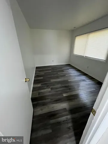 a view of a livingroom and window