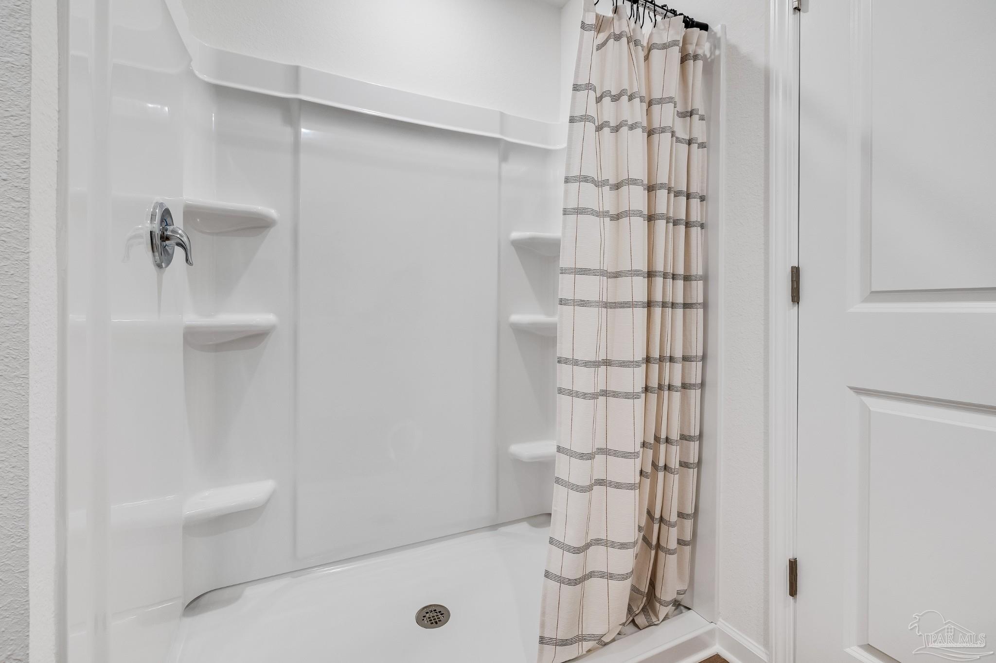 5360 Horizons Edge Lane Milton, FL 32583 - Photo 28 of 53 a bathroom with a shower