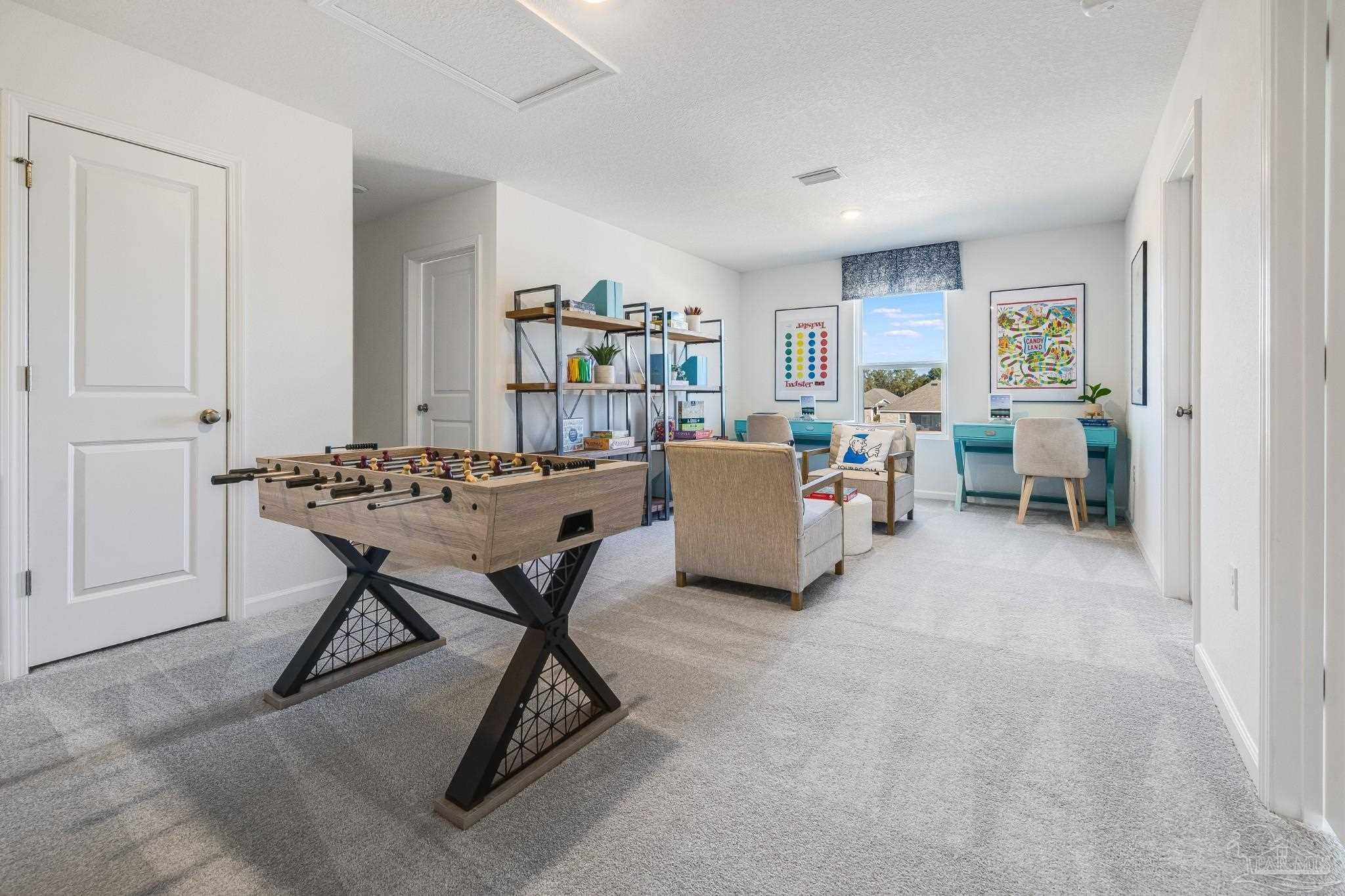5360 Horizons Edge Lane Milton, FL 32583 - Photo 35 of 53 a living room with furniture a rug and a window