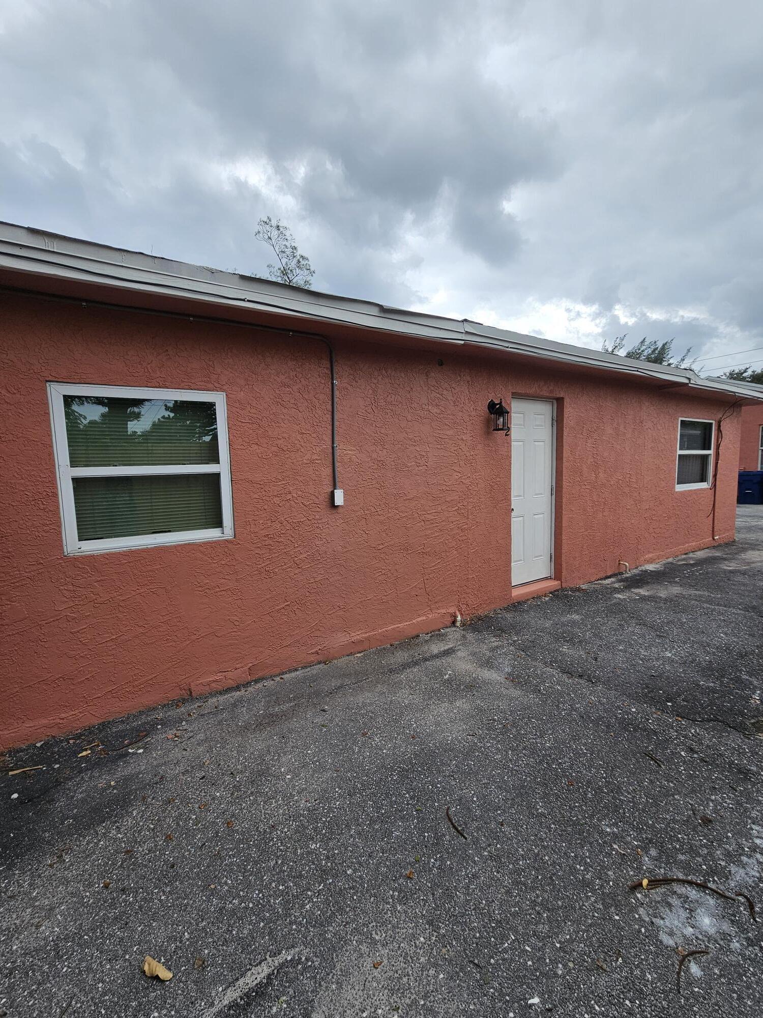 148 West 14th Street, Unit 2 Riviera Beach, FL 33404 - Photo 6 of 6 a view of an outdoor space