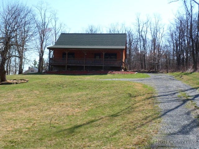 279 Indian Springs Road Boone, NC 28607 - Photo 1 of 15 a front view of a house with a yard