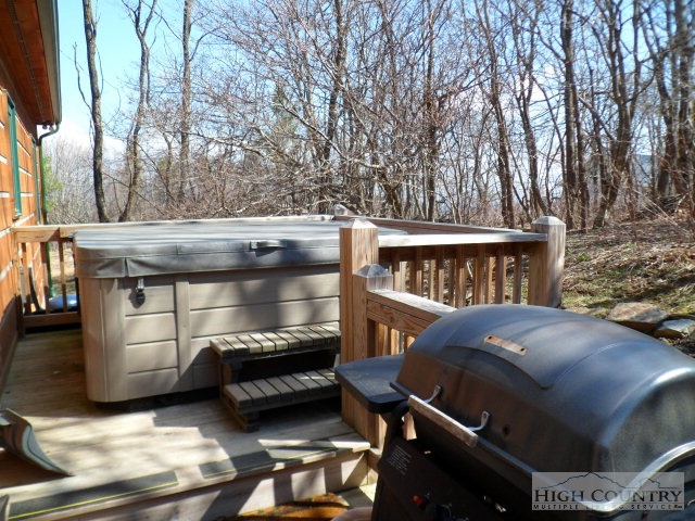 279 Indian Springs Road Boone, NC 28607 - Photo 12 of 15 a view of a roof deck with couches and wooden floor