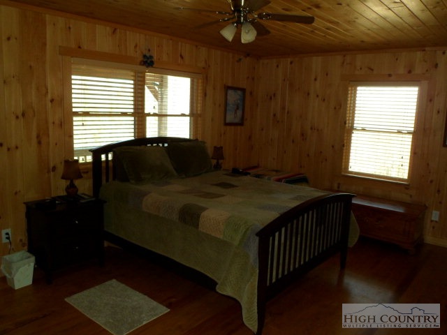 279 Indian Springs Road Boone, NC 28607 - Photo 13 of 15 a bedroom with a bed and a window