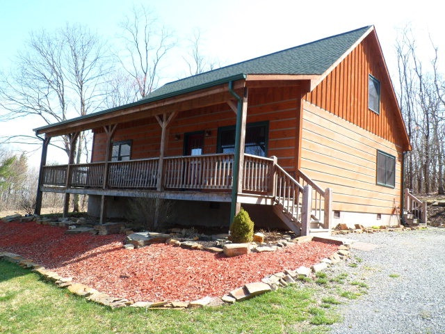 279 Indian Springs Road Boone, NC 28607 - Photo 8 of 15 a view of a house with a yard
