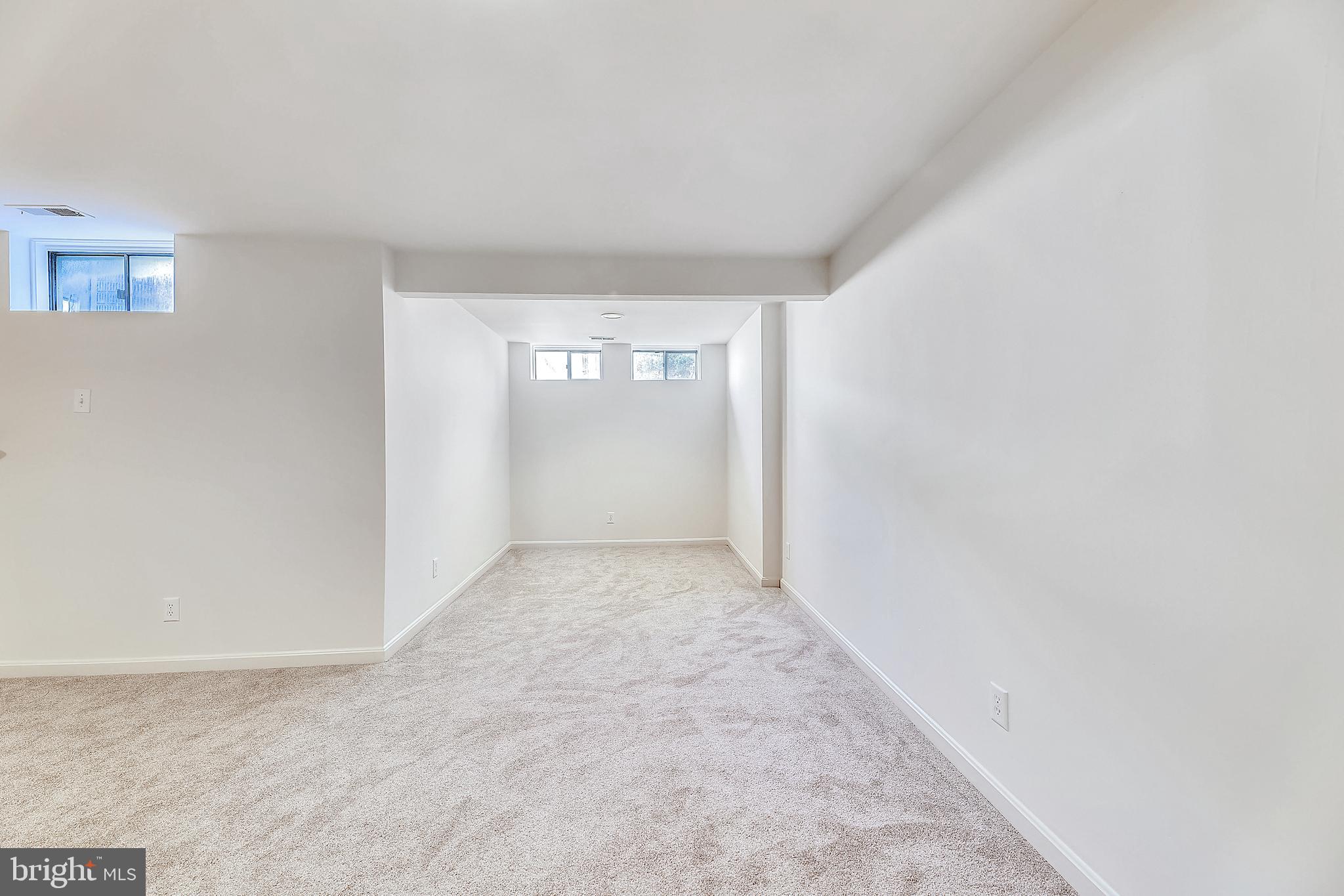 3804 Colony Point Place Edgewater, MD 21037 - Photo 27 of 34 Family Room has several windows for natural light
