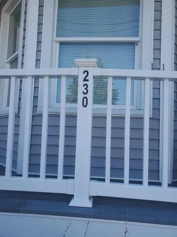 a view of a backyard with sitting area