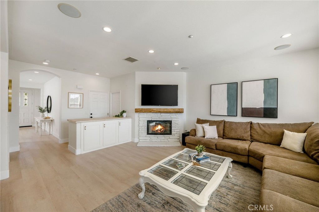 1204 Vista Jardin San Clemente, CA 92673 - Photo 19 of 55 a living room with furniture and a flat screen tv