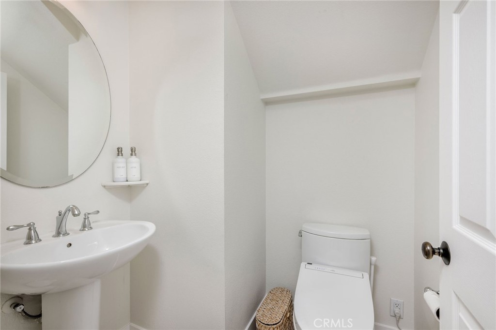 1204 Vista Jardin San Clemente, CA 92673 - Photo 23 of 55 a bathroom with a sink toilet and a mirror