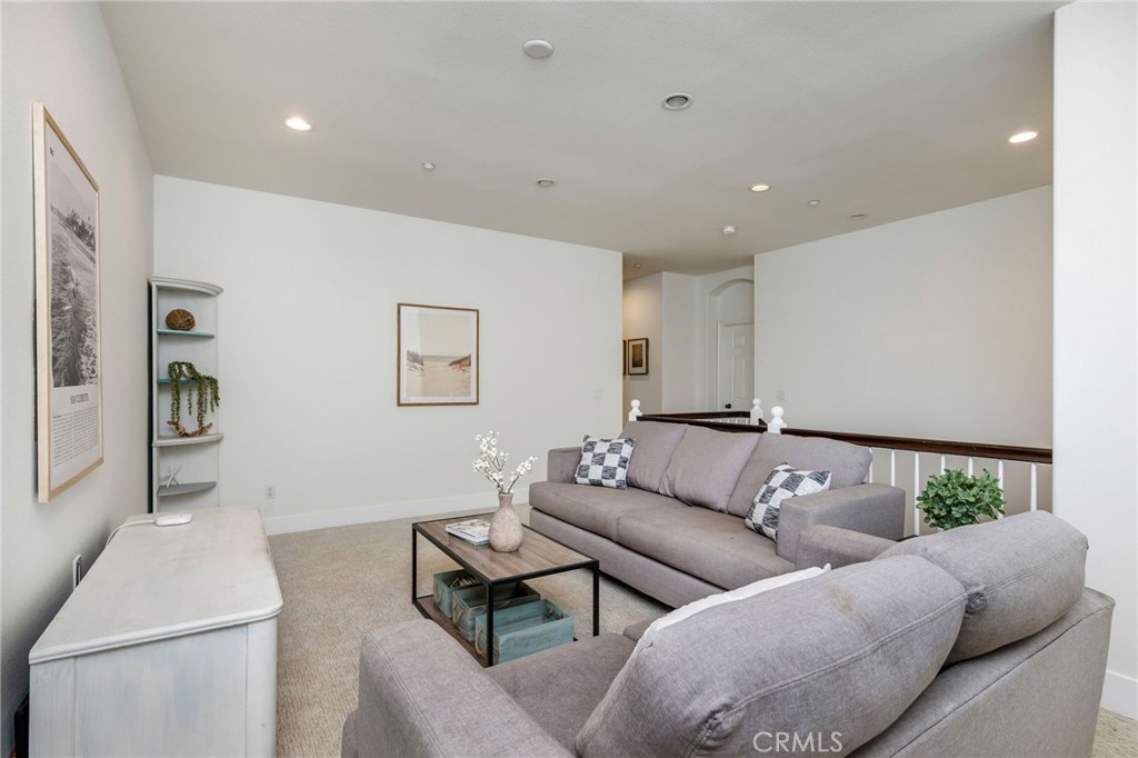 1204 Vista Jardin San Clemente, CA 92673 - Photo 26 of 55 a living room with furniture and a couch
