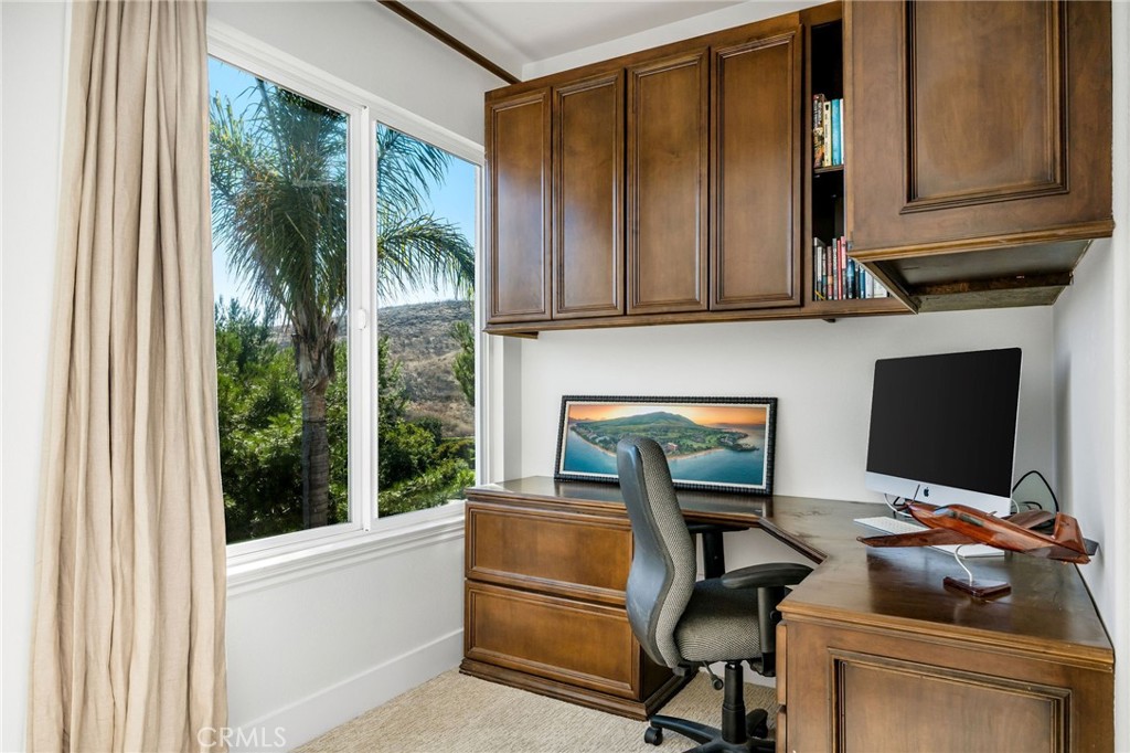 1204 Vista Jardin San Clemente, CA 92673 - Photo 29 of 55 a view of a workspace with furniture and a window