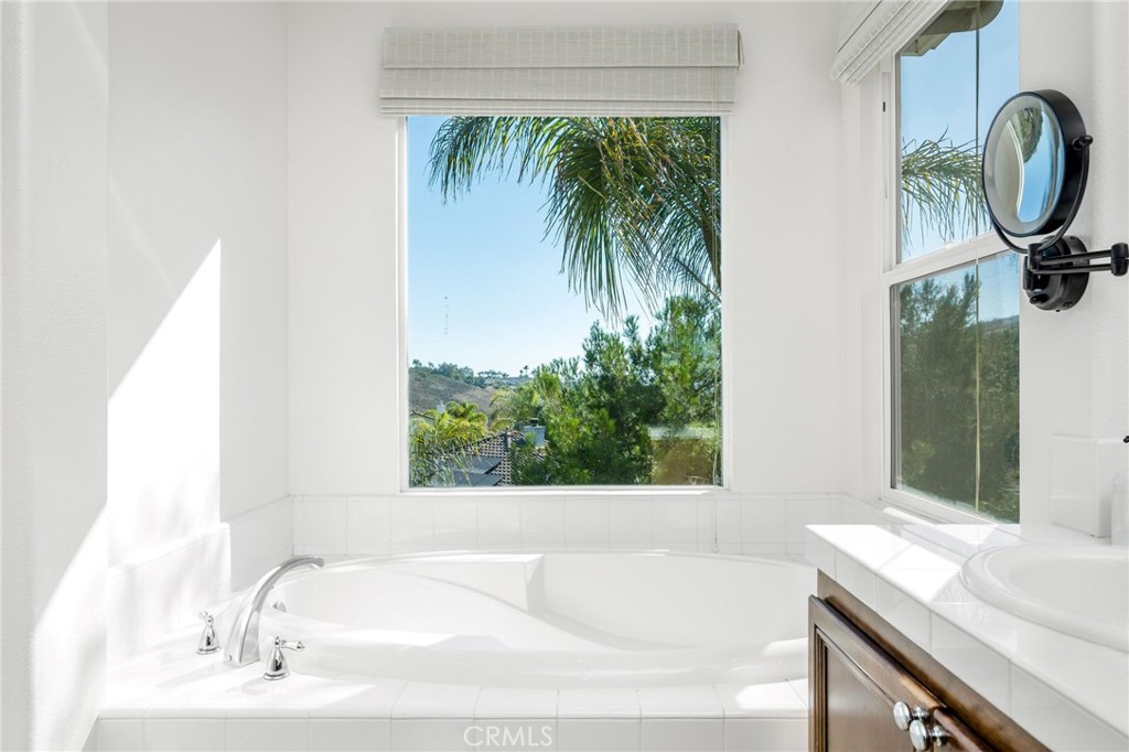 1204 Vista Jardin San Clemente, CA 92673 - Photo 33 of 55 a bathroom with a bathtub and a sink
