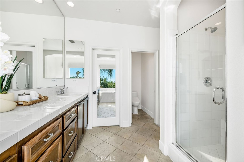 1204 Vista Jardin San Clemente, CA 92673 - Photo 34 of 55 a bathroom with a sink a toilet and shower