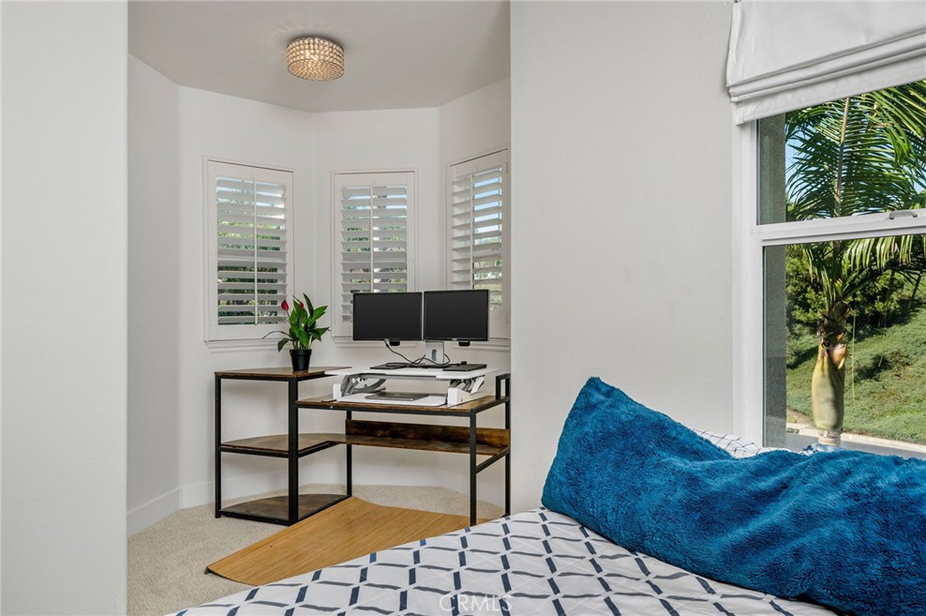 1204 Vista Jardin San Clemente, CA 92673 - Photo 36 of 55 a living room with furniture and a window