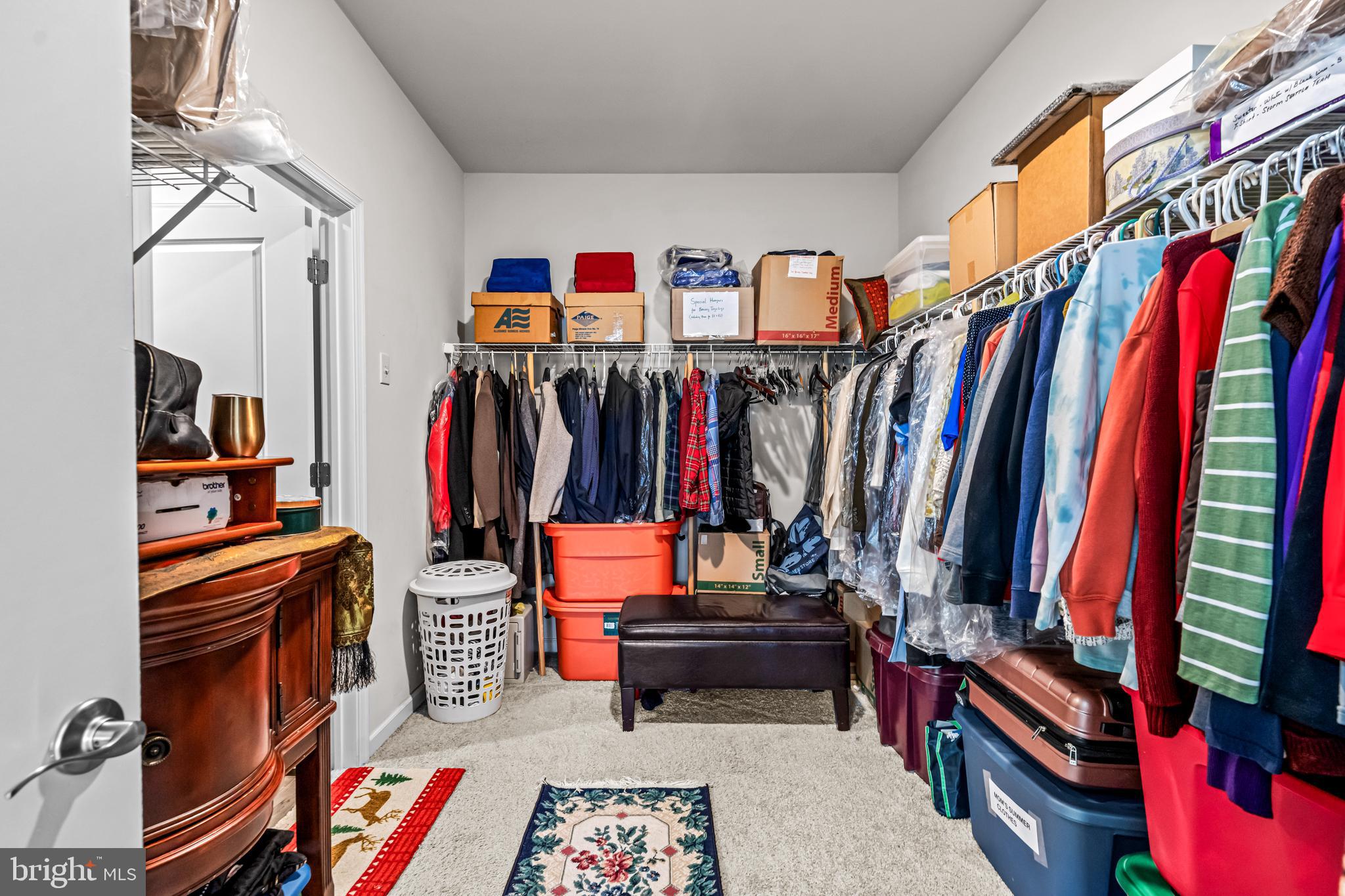 74 Walton Way Delanco, NJ 08075 - Photo 15 of 21 a view of walk in closet with clothes and shoes
