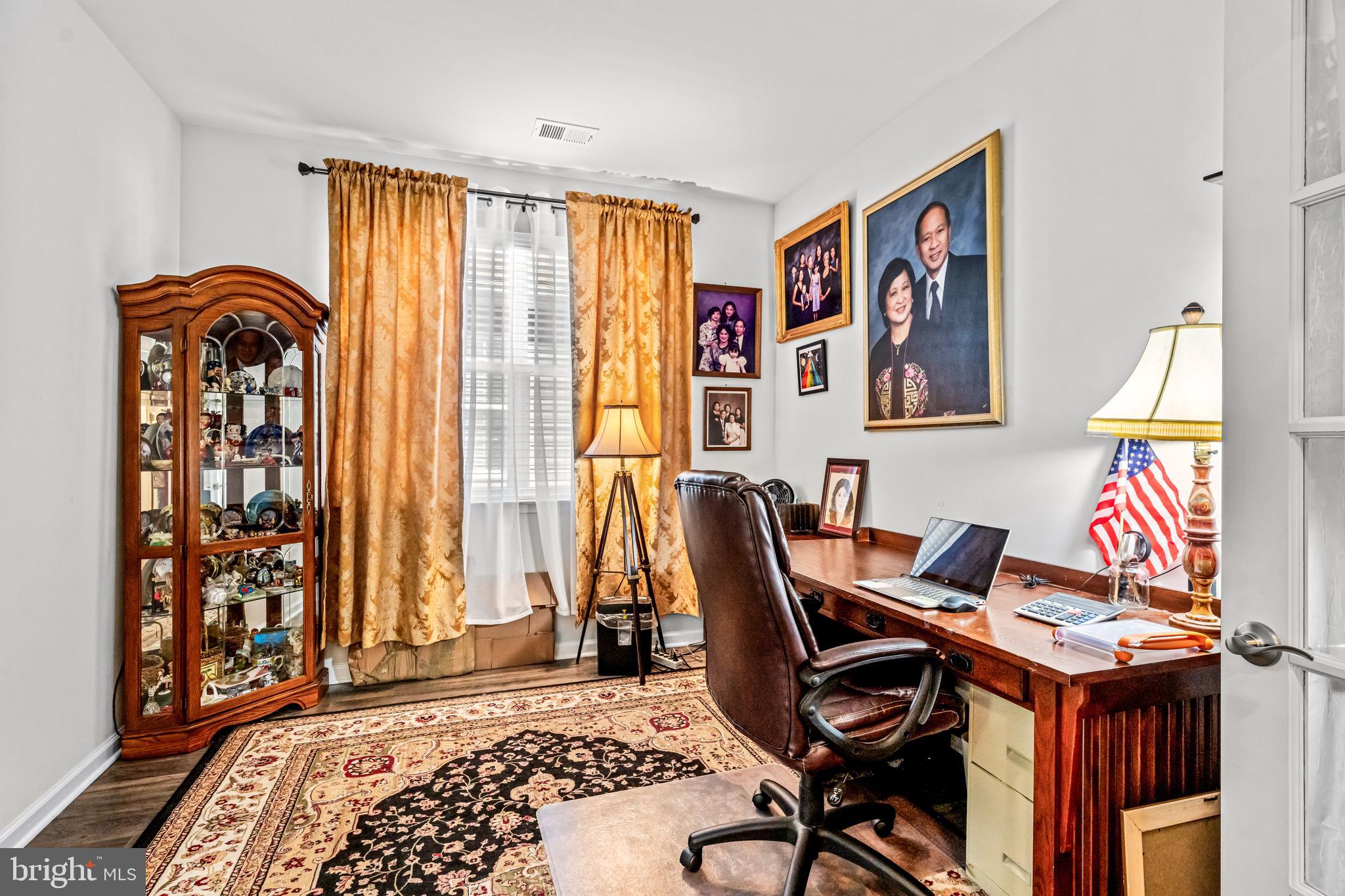 74 Walton Way Delanco, NJ 08075 - Photo 17 of 21 a view of a workspace with furniture and a window