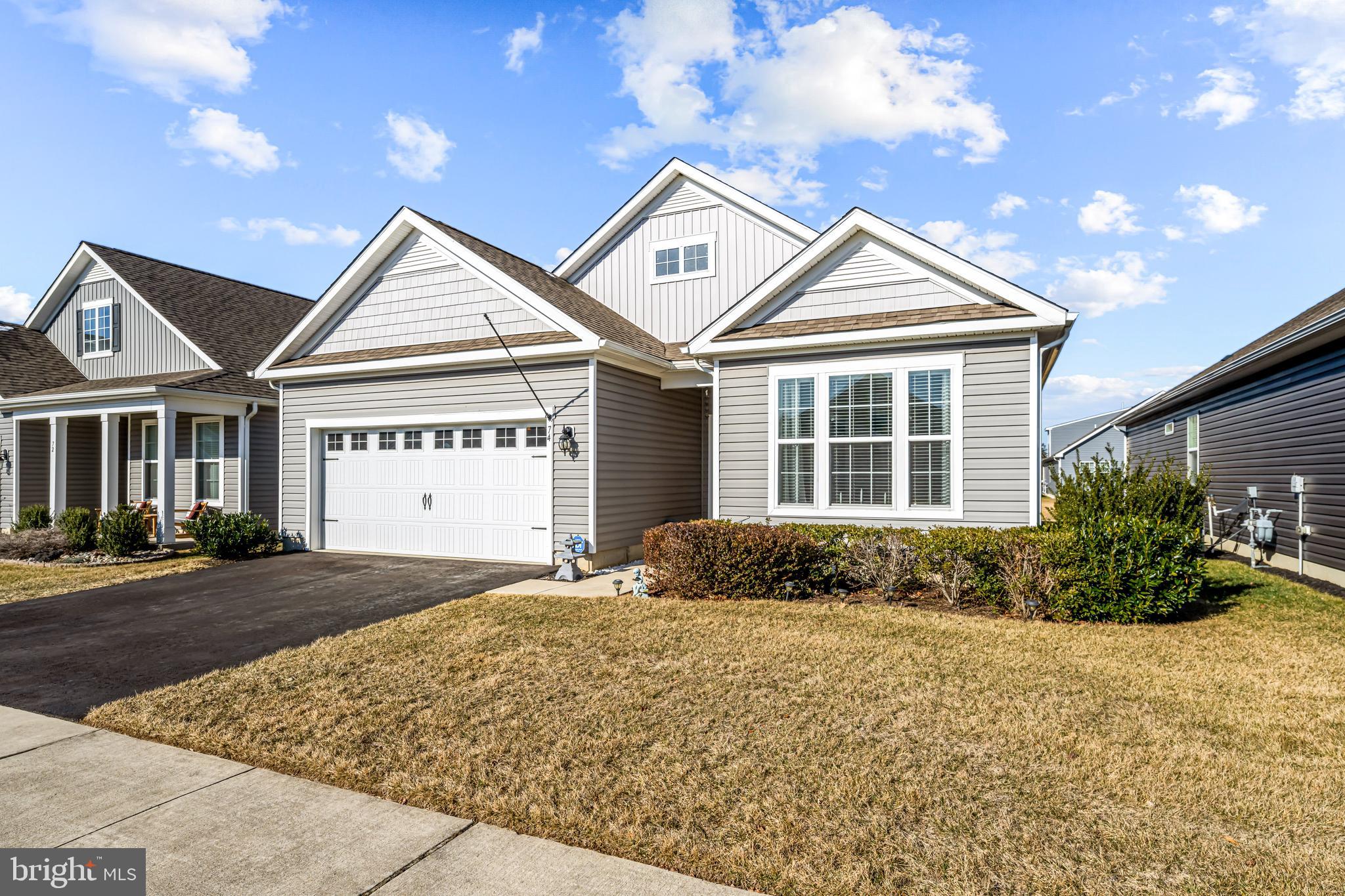 74 Walton Way Delanco, NJ 08075 - Photo 2 of 21 a front view of a house with a yard