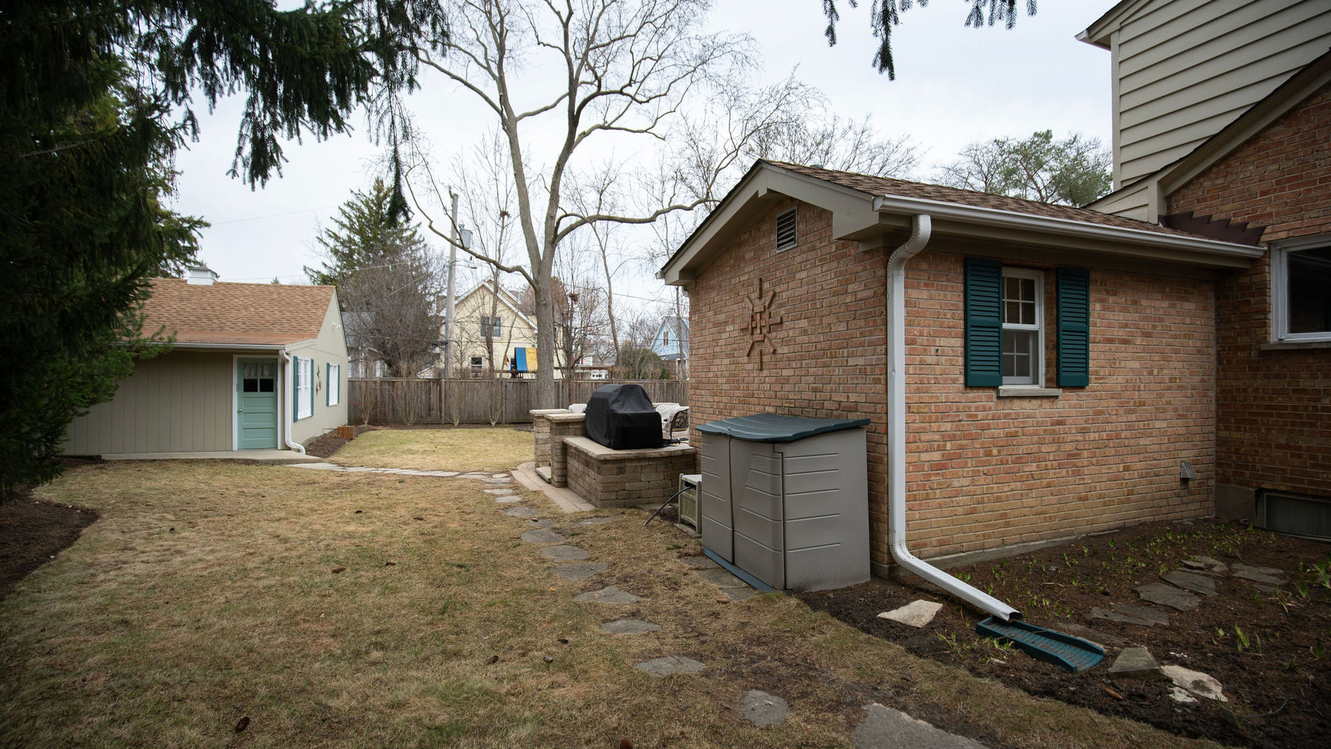 1836 Oak Avenue Northbrook, IL 60062 - Photo 26 of 41 a backyard of a house with table and chairs