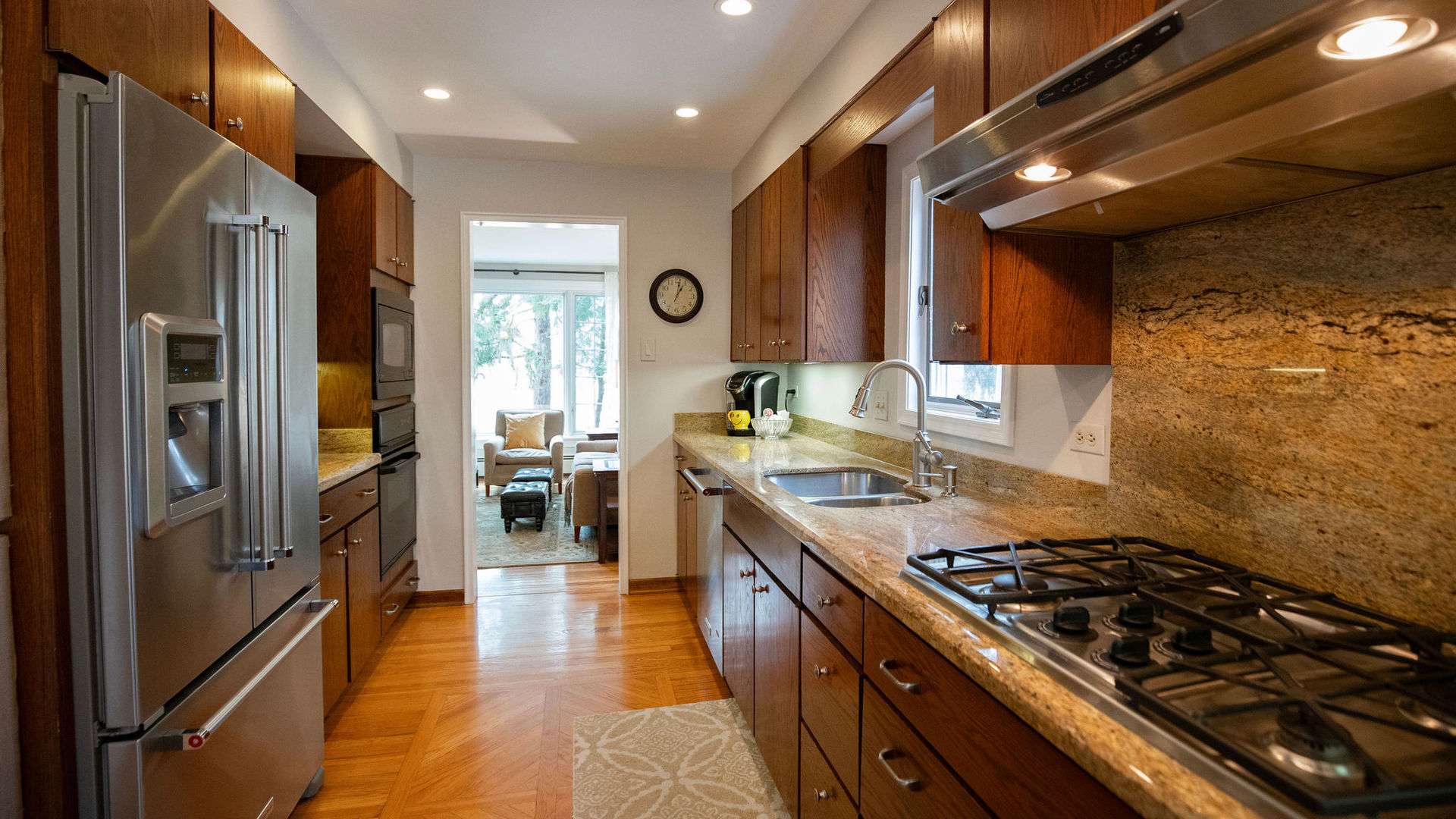 1836 Oak Avenue Northbrook, IL 60062 - Photo 4 of 41 a kitchen with stainless steel appliances granite countertop a stove a refrigerator and a refrigerator