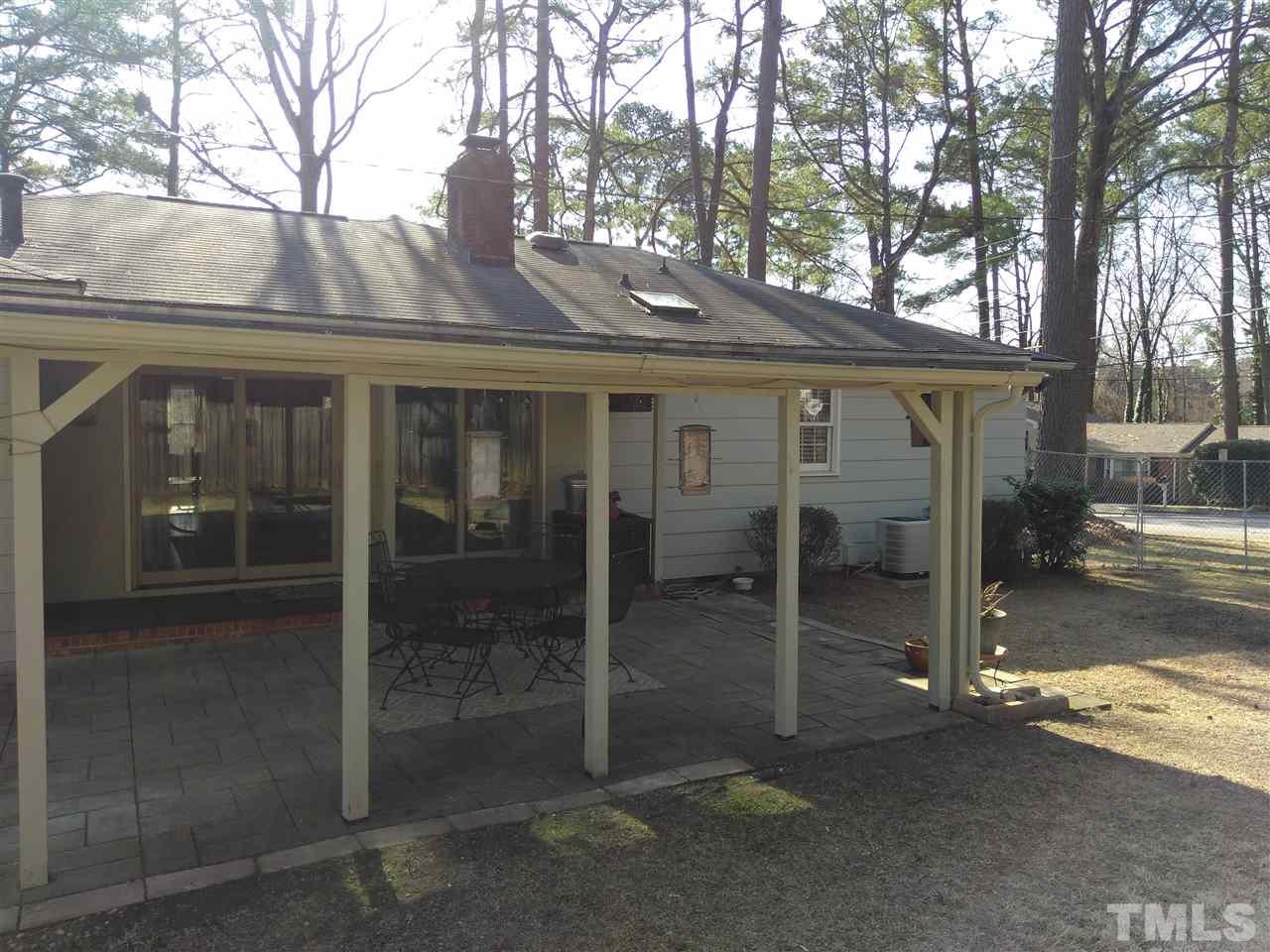 4101 Amherst Lane Raleigh, NC 27609 - Photo 3 of 17 a view of a house with a yard