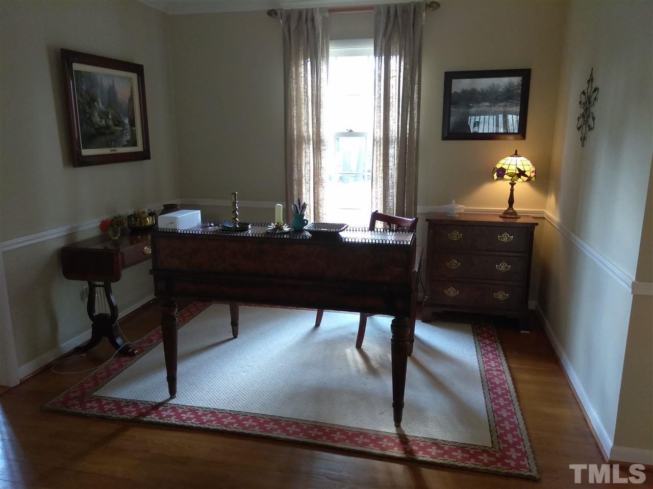 4101 Amherst Lane Raleigh, NC 27609 - Photo 10 of 17 a room with furniture and window