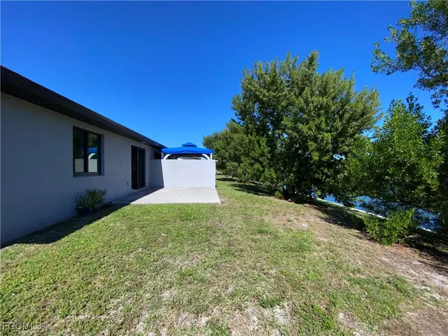 a house with yard in front of it