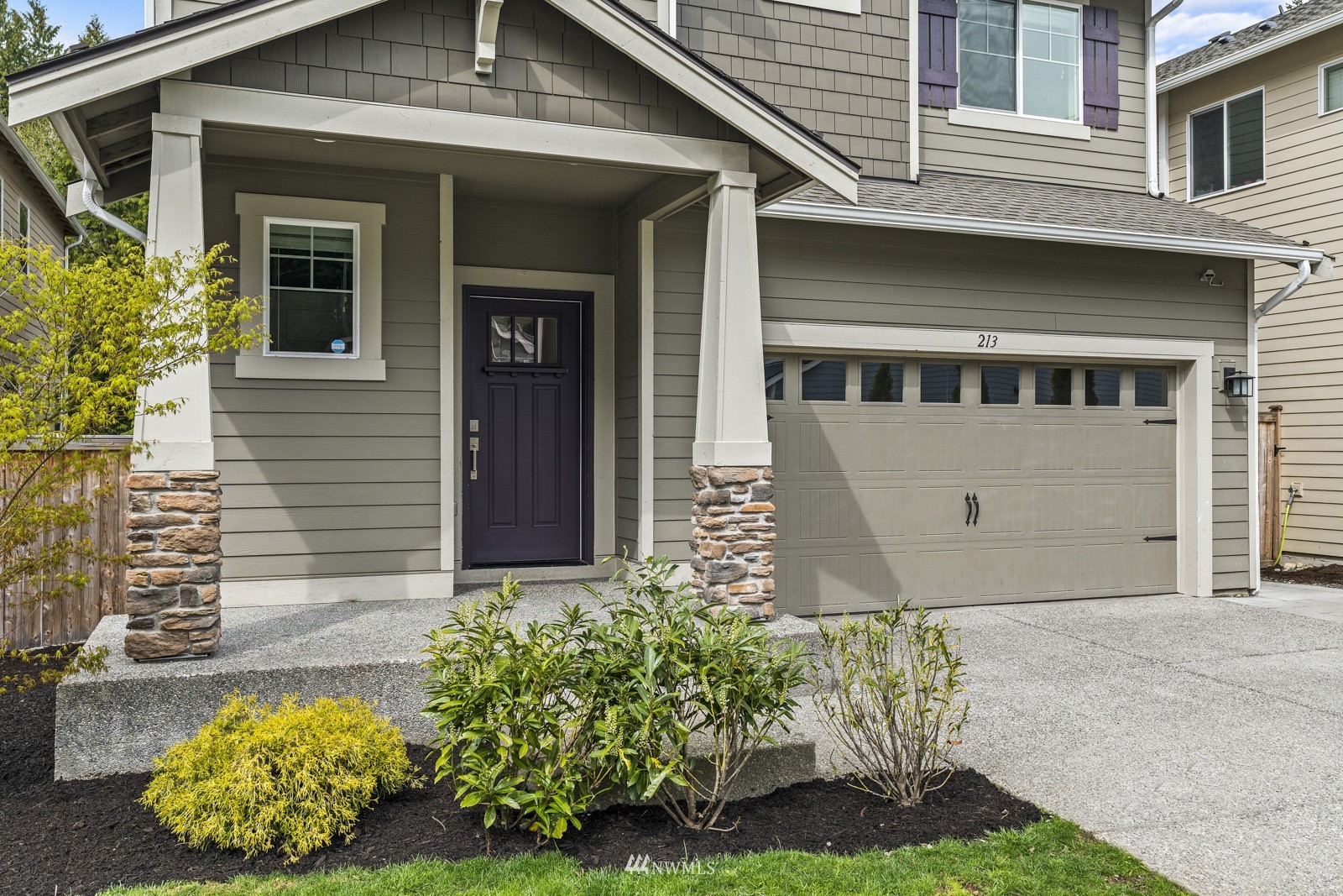 213 178th Street Southeast Bothell, WA 98012 - Photo 1 of 1 a front view of a house with garden