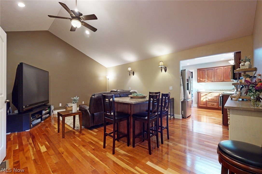 2531 Blake Road Wadsworth, OH 44281 - Photo 28 of 34 In the addition, this is the combined living and dining room with a vaulted ceiling and a granite island.