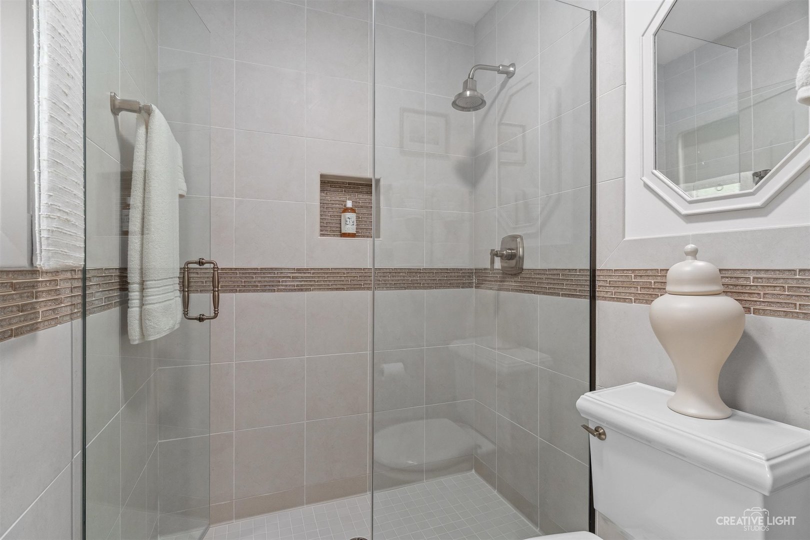 527 Sheffield Road Naperville, IL 60565 - Photo 17 of 27 a bathroom with a shower
