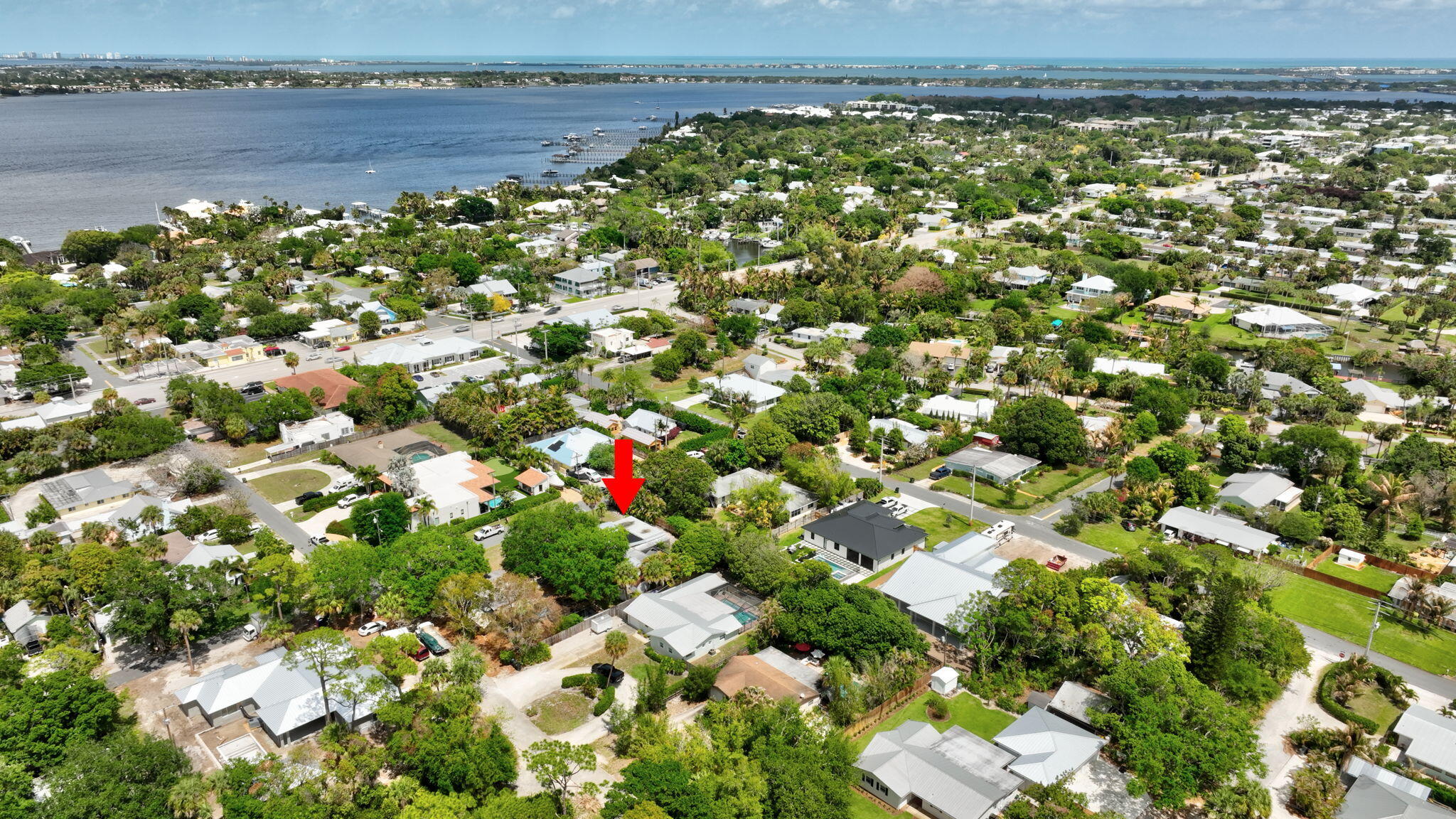 1040 Southeast 5th Street Stuart, FL 34996 - Photo 20 of 21 a view of a lake with a tree