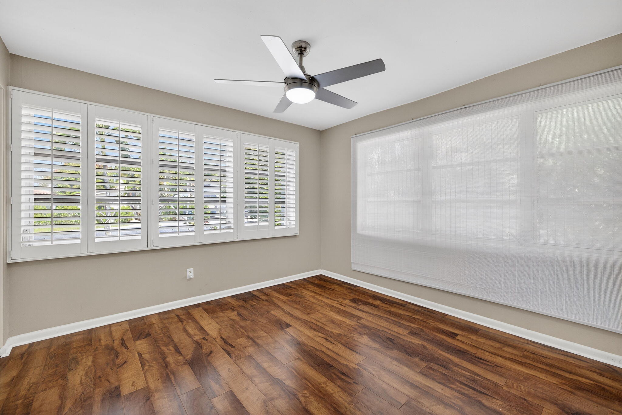 1040 Southeast 5th Street Stuart, FL 34996 - Photo 8 of 21 a view of an empty room with a window