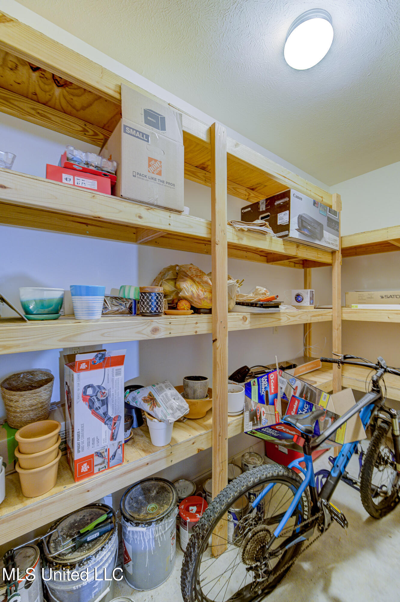 127 Rockbridge Crossing Clinton, MS 39056 - Photo 35 of 55 Two-Car Garage Storage Room
