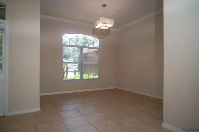 an empty room that has a window