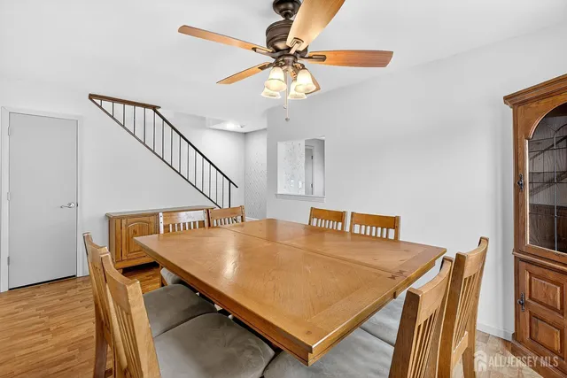 a room with table and white walls