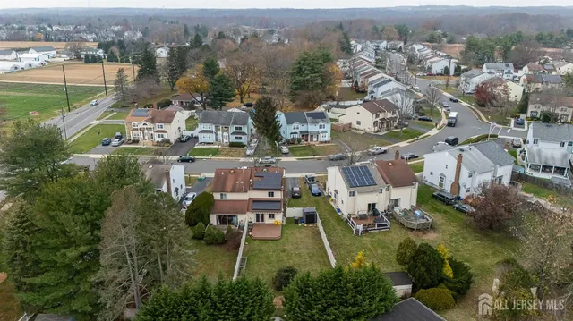 a picture of a bench in front of a wall