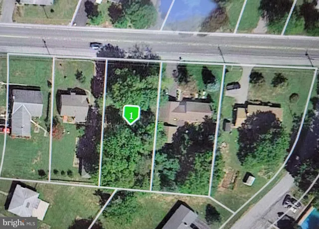 a view of a backyard with garden