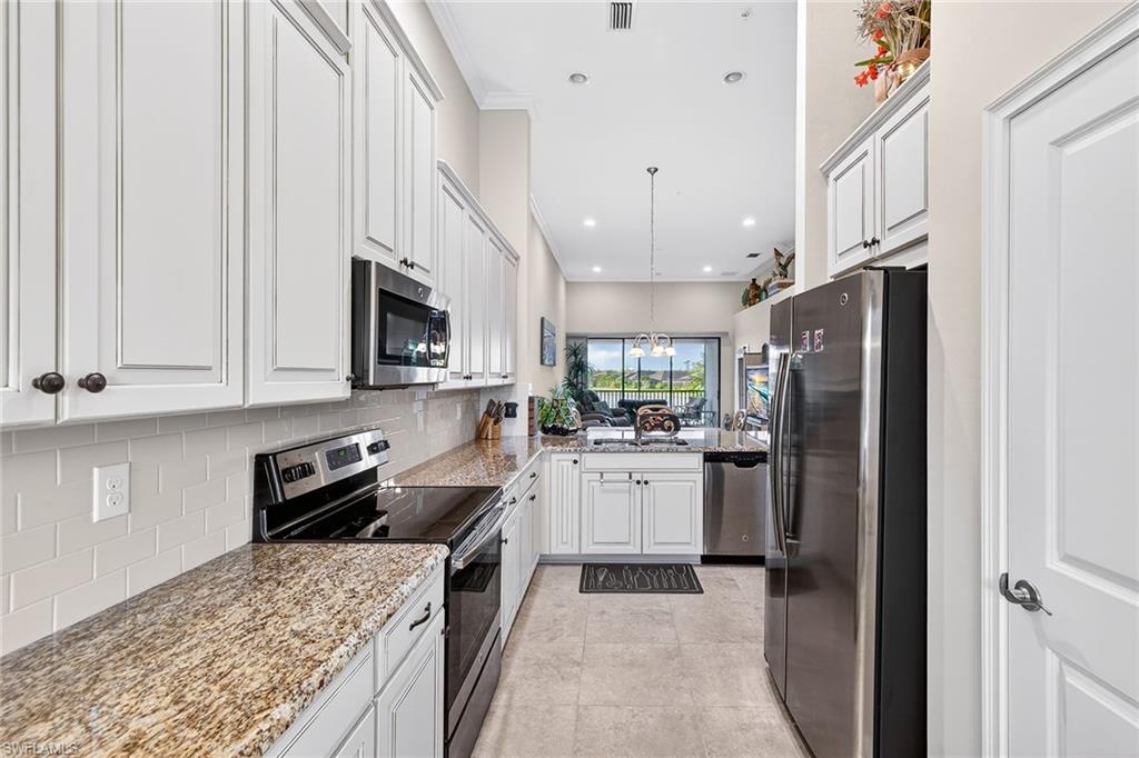 9419 Benvenuto Court, Unit 202 Naples, FL 34119 - Photo 11 of 44 Kitchen