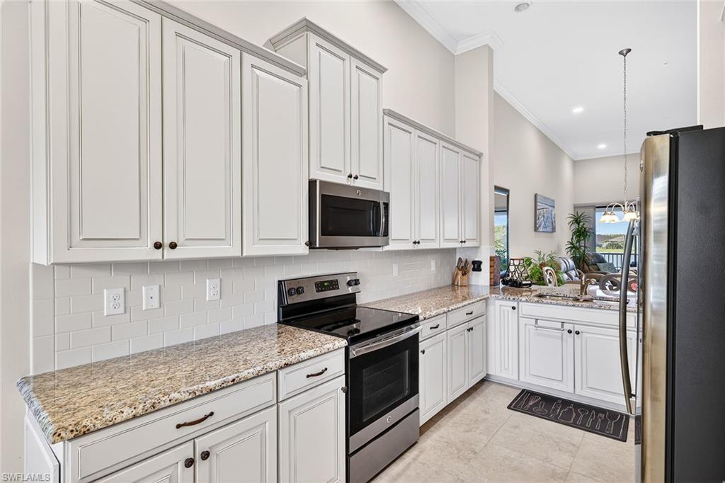 9419 Benvenuto Court, Unit 202 Naples, FL 34119 - Photo 12 of 44 Kitchen