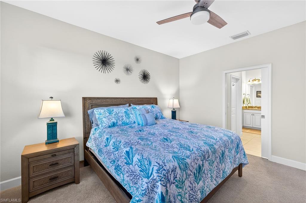 9419 Benvenuto Court, Unit 202 Naples, FL 34119 - Photo 16 of 44 Primary Bedroom