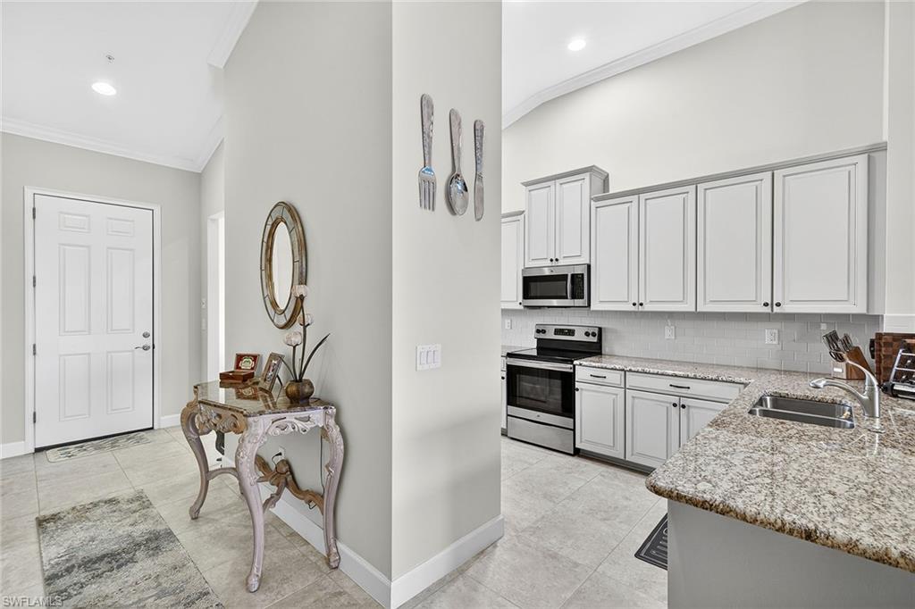 9419 Benvenuto Court, Unit 202 Naples, FL 34119 - Photo 2 of 44 Entrance Foyer