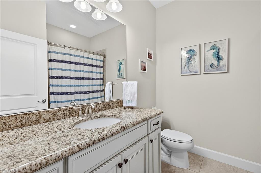 9419 Benvenuto Court, Unit 202 Naples, FL 34119 - Photo 23 of 44 Guest Bathroom