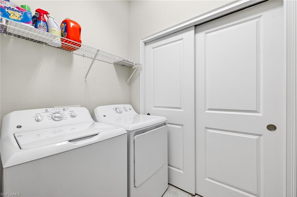 9419 Benvenuto Court, Unit 202 Naples, FL 34119 - Photo 26 of 44 Laundry and Utility Closet in unit