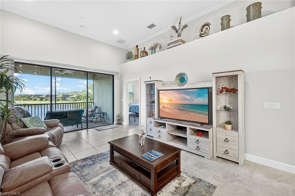 9419 Benvenuto Court, Unit 202 Naples, FL 34119 - Photo 5 of 44 Living Room