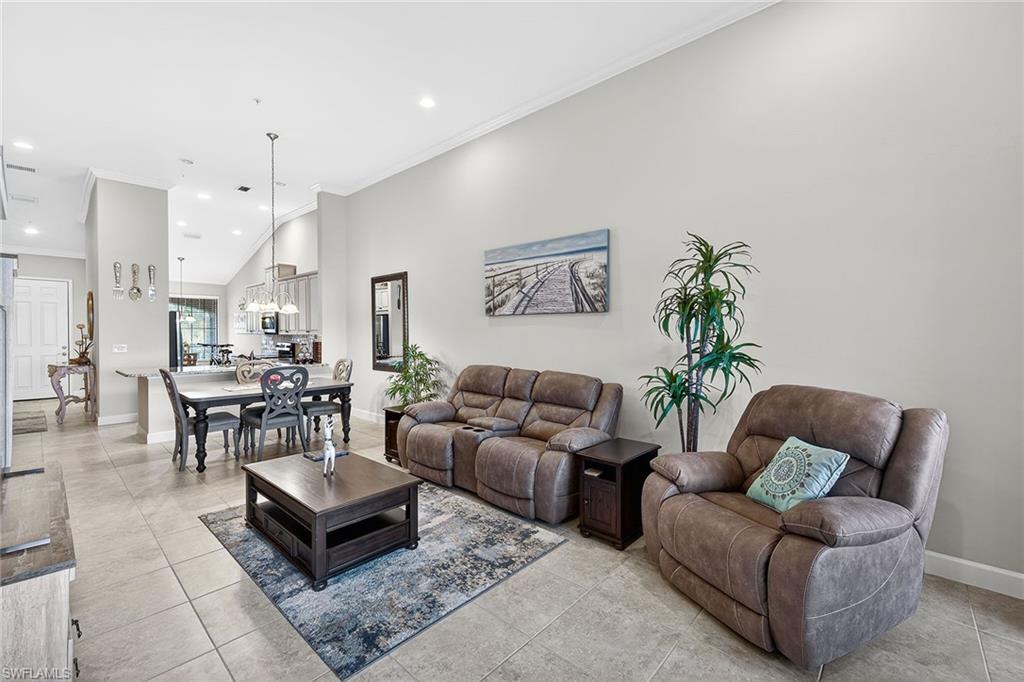 9419 Benvenuto Court, Unit 202 Naples, FL 34119 - Photo 6 of 44 Living Room