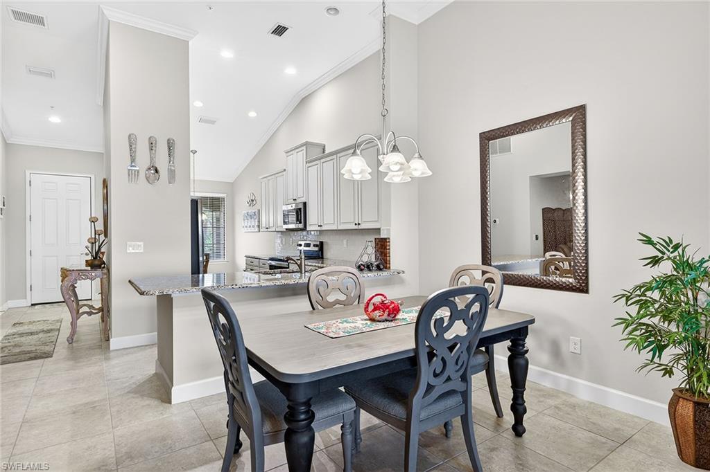 9419 Benvenuto Court, Unit 202 Naples, FL 34119 - Photo 7 of 44 Dining Room
