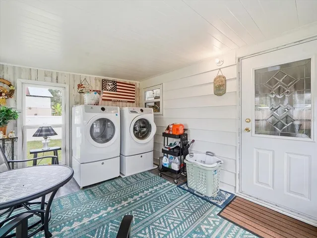a utility room with dryer and washer