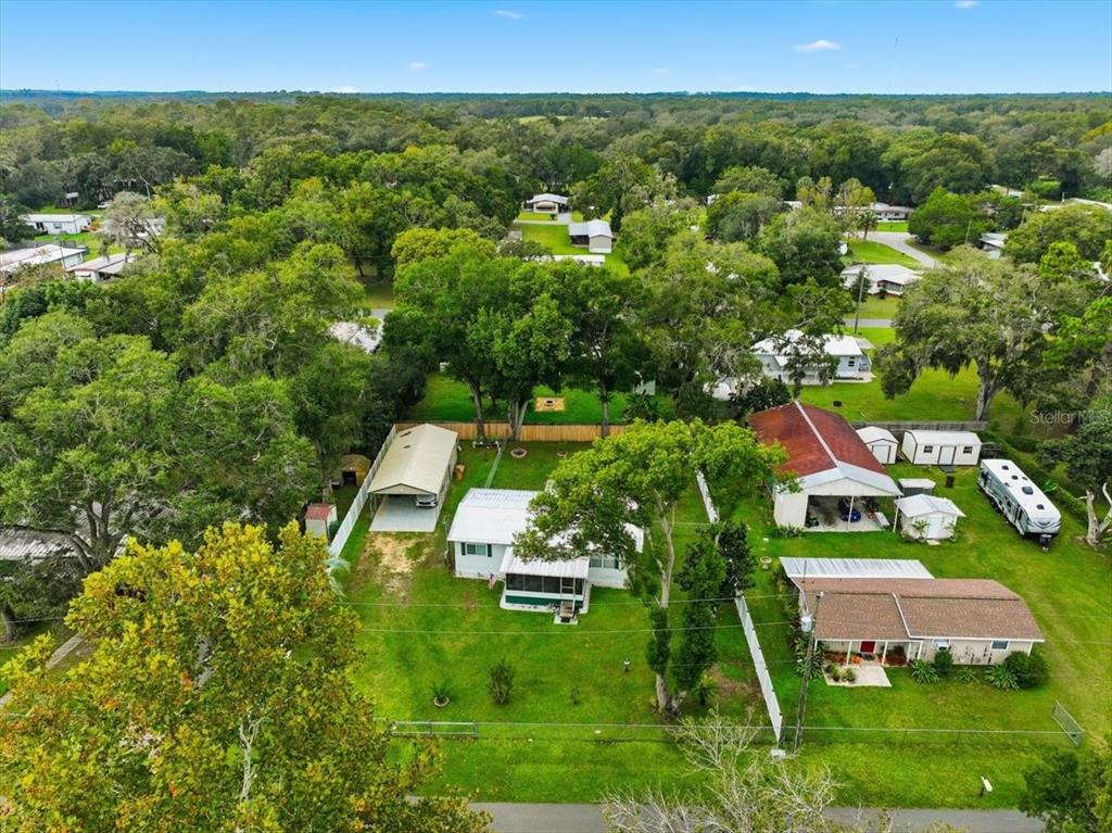 1422 North Reed Terrace Inverness, FL 34453 - Photo 31 of 39 a view of a garden with lawn chairs